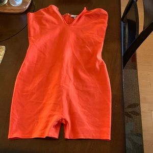 Orange body suit romper